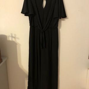 Black jumpsuit. One piece.